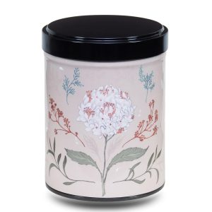 Artist's metal tea box illustrated with a drawing of a white flower on a beige background