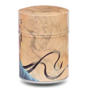 Metal tea caddy featuring a young woman with red hair surrounded by herons on a light brown background.