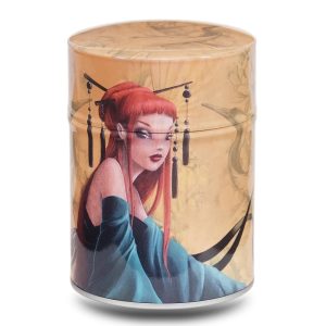 Metal tea caddy featuring a young woman with red hair surrounded by herons on a light brown background.