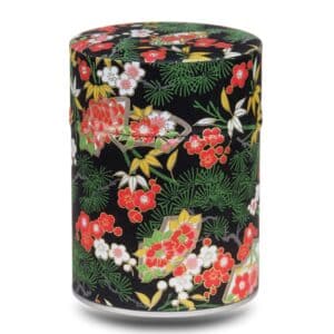 boite a the noir avec fleur rouge