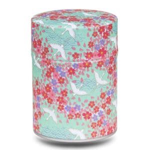 boite a the turquoise avec grues blanches