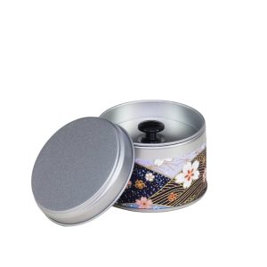 small metal travel tea box covered with washi paper - open