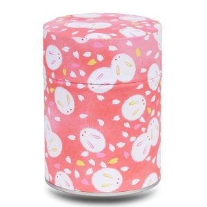 pink/red/coral tea box with rabbit